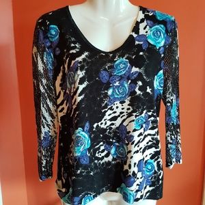 Floral knit top with crocheted 3/4 sleeves